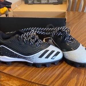 Brand new Adidas baseball cleats.